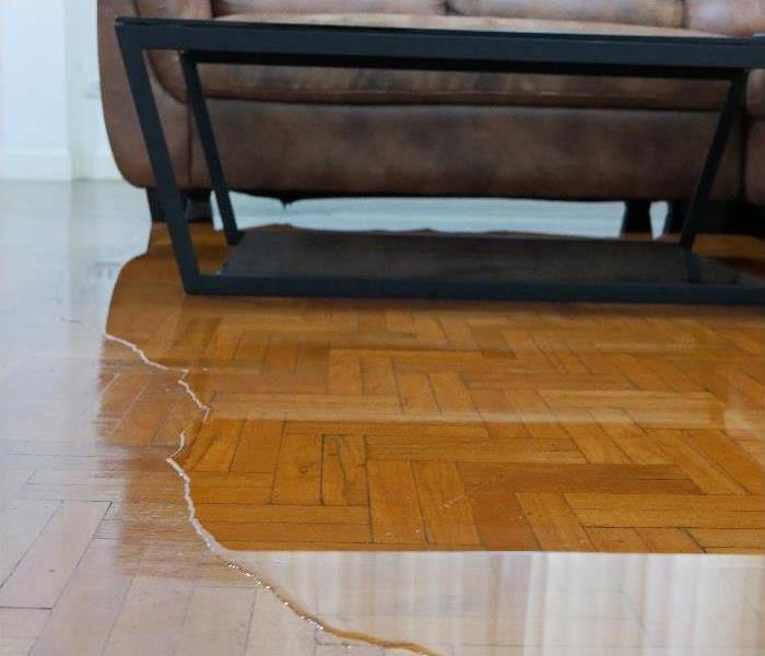 Close up of water flooding on living room